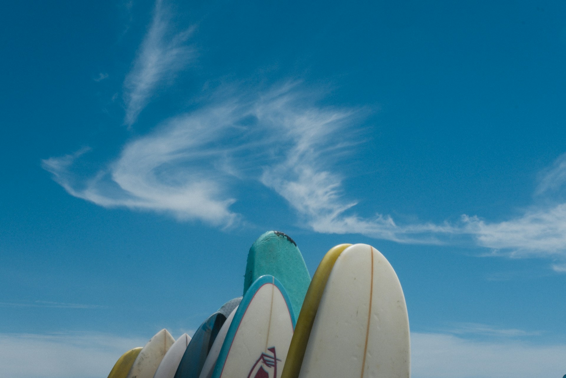 Surfboards with blue sky |