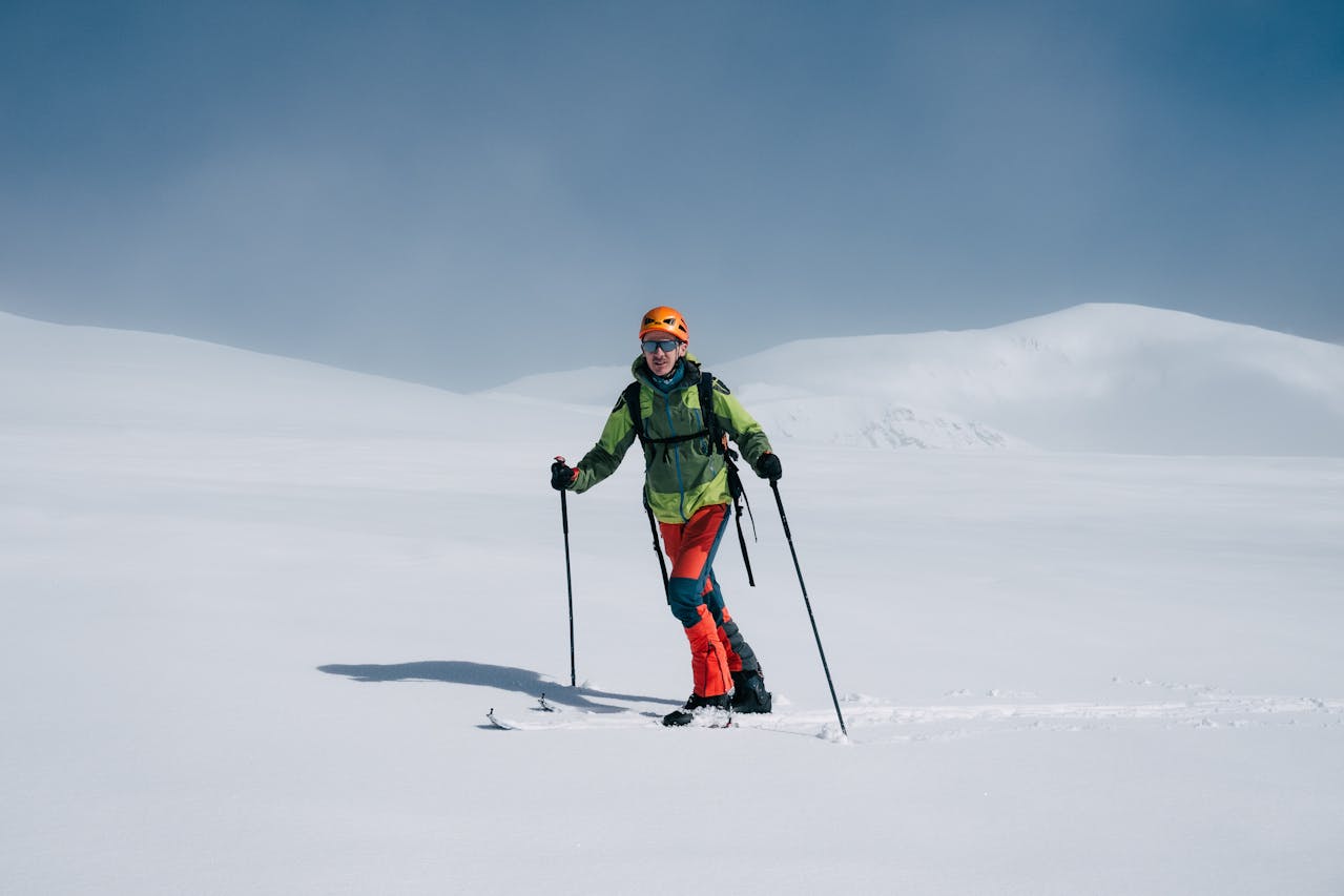 man snowshoeing in Snowy Mountain  |